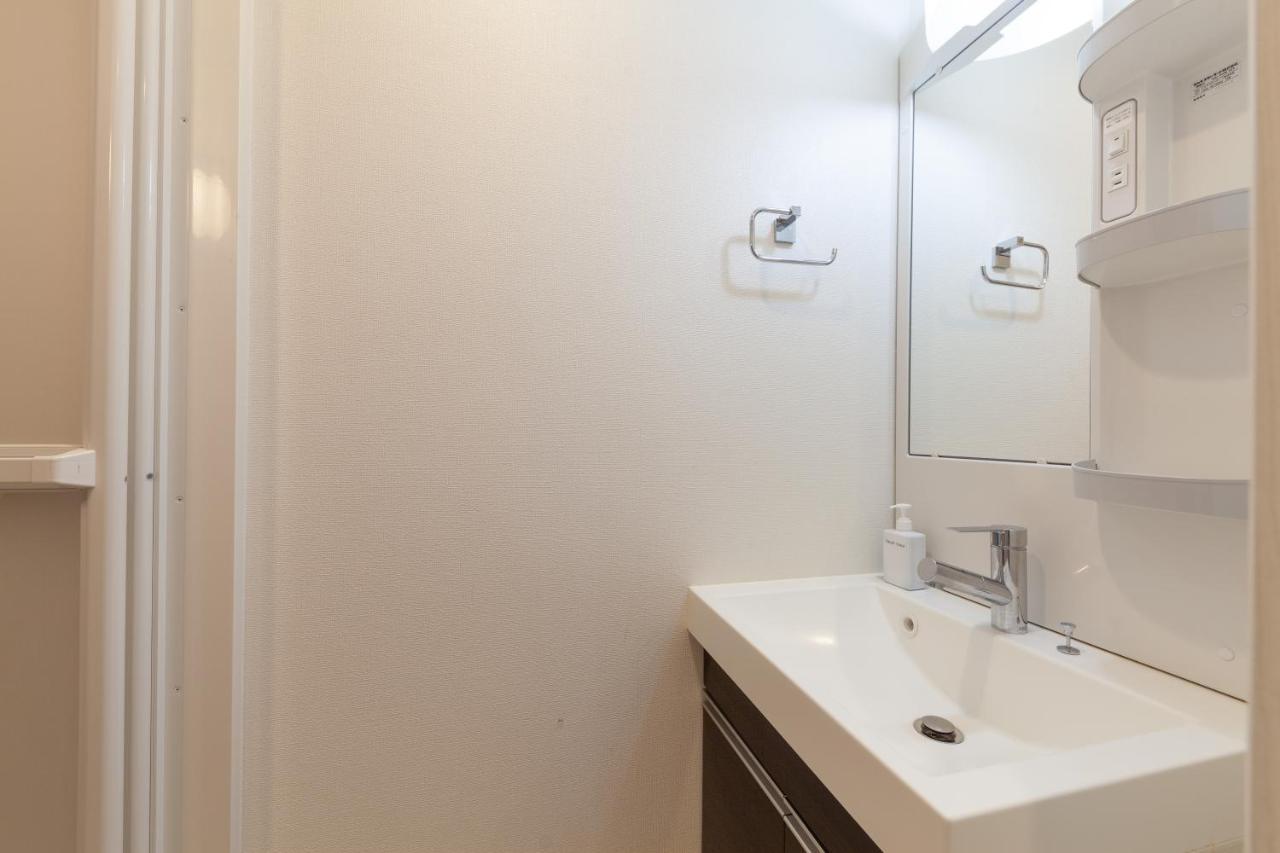 Tokyo Sunshine Tower Apartment Bagian luar foto